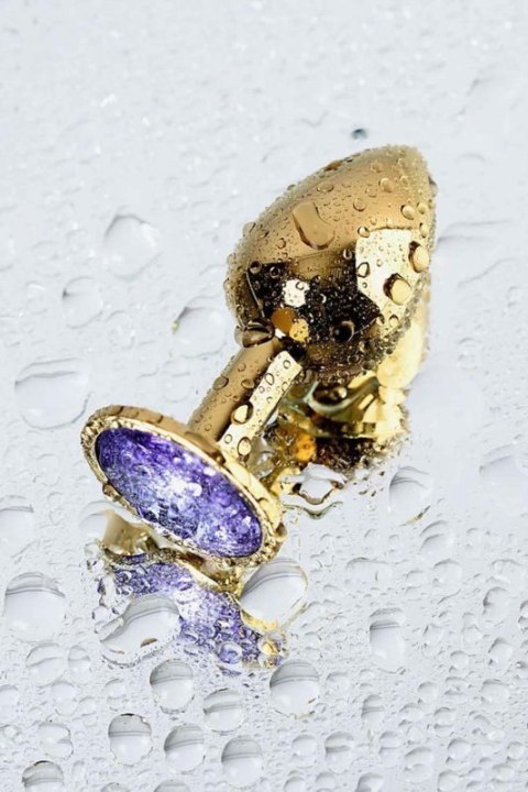Golden anal plug TOYFA Metal,with a amethyst colored gem